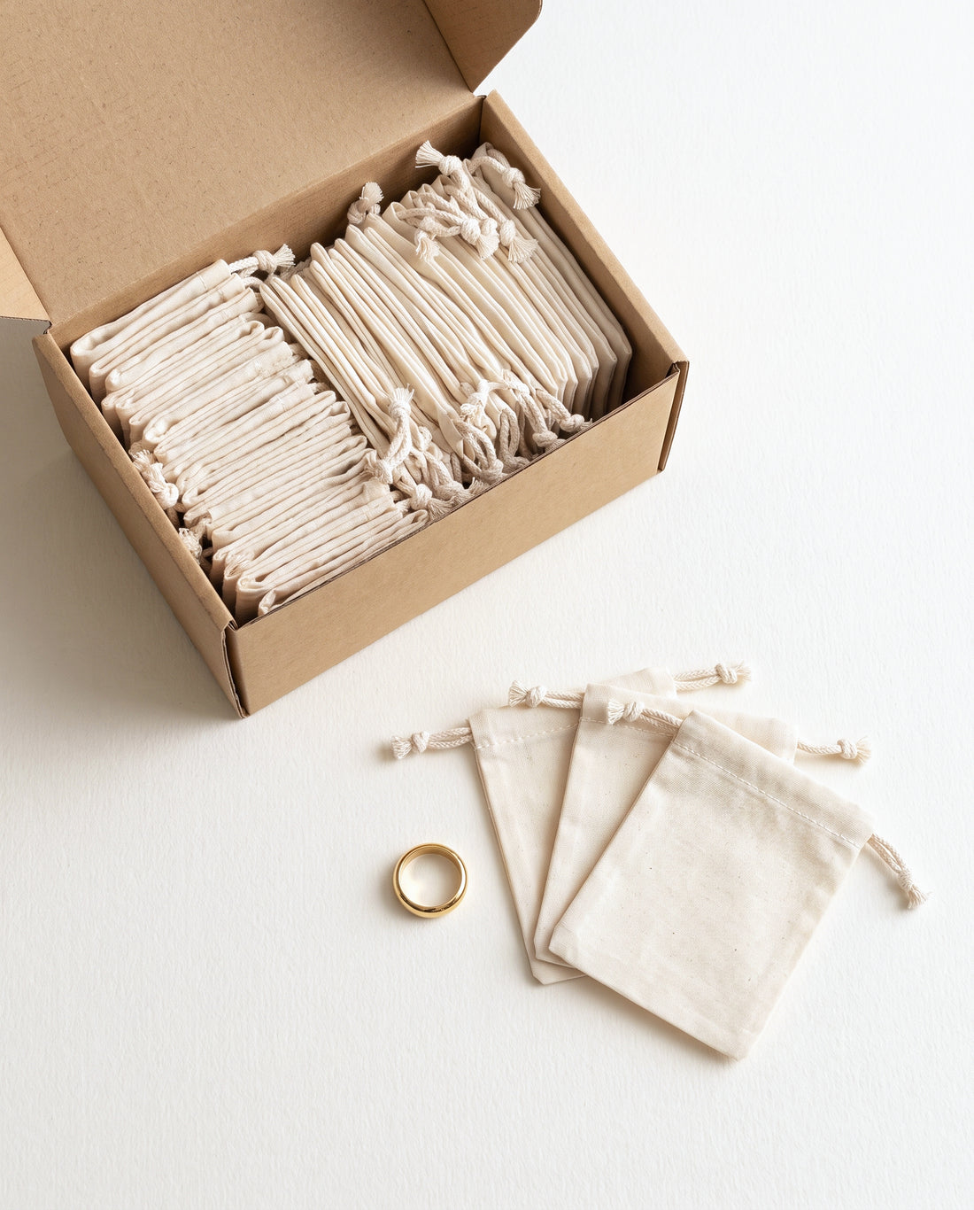 Wholesale box of plain natural cotton muslin double drawstring bags