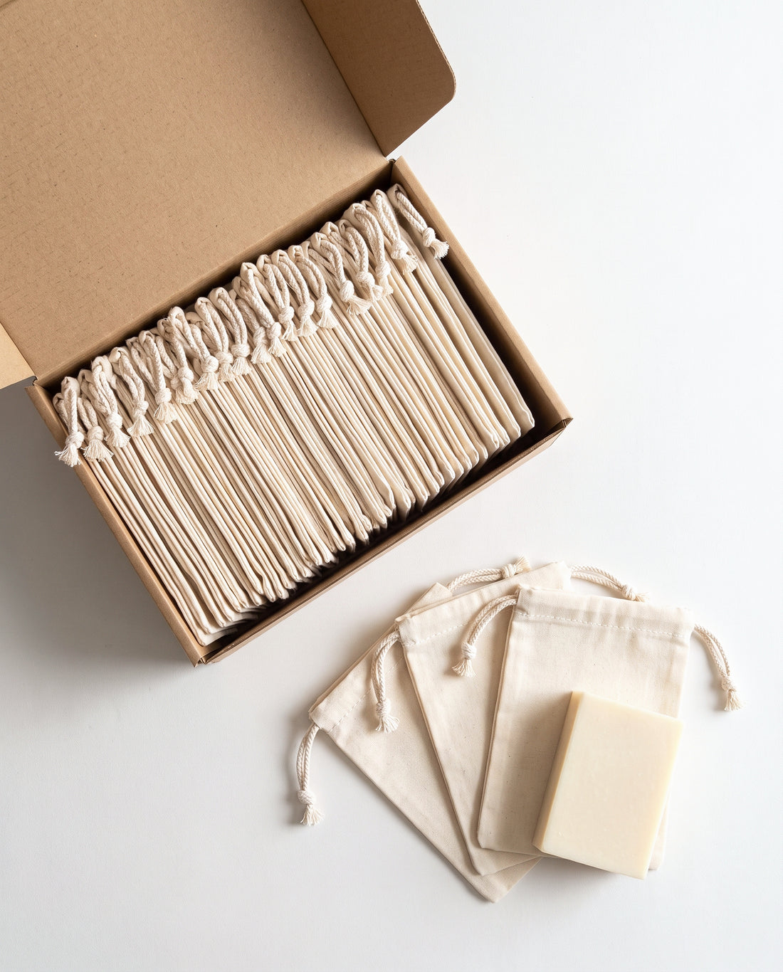 Wholesale box of plain natural cotton muslin double drawstring bags